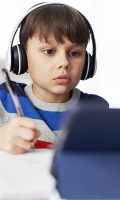 boy-in-headphone-during-homeschooling-2021-08-31-22-23-55-utc-min.jpg